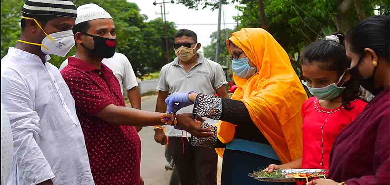 Muslim girls tying Rakhi to brothers